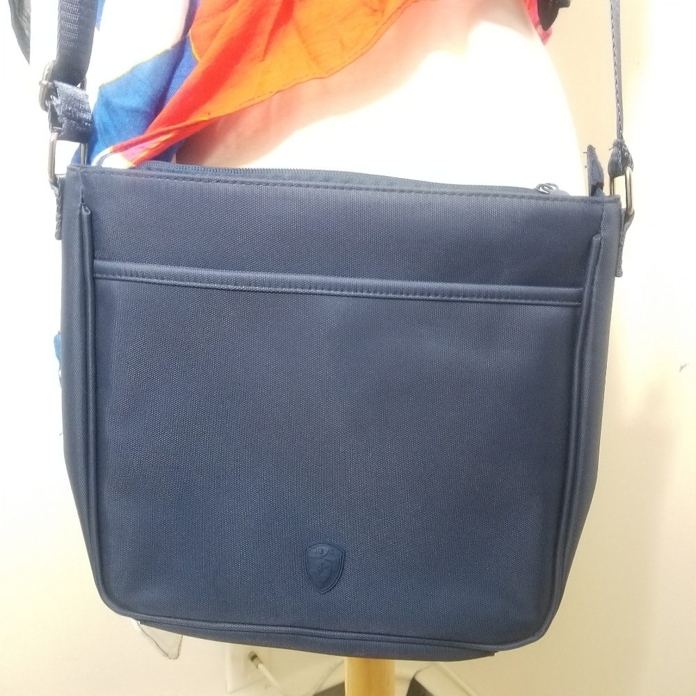 Heys Hilite crossbody navy blue RFID travel bag